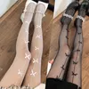 Calcetines de mujer Summer Punk Hollow Out Mesh Pantyhose Cute Bowknot Pattern Fishnet Medias Harajuku Sexy Hosiery Women's Lolita Nylon Tights