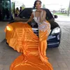 Fantastisk Rhinestone Mermaid Prom -klänningar 2023 Orange Bead Long Evening Party Gowns Sheer Neck Satin Robe de Bal