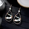 Boucles d'oreilles pendantes RKR pour femmes Unique pierre naturelle Baroque Imitation perle perles de verre alliage oreille crochet 2023 bijoux de mode