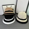 Modemärke designer hink hattar män och kvinnor sommarfärg metall triangel cap hatt