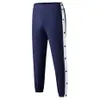 Pantaloni da uomo Pantaloni sportivi Pantaloni da jogging Casual Tear Away Loose Fit Basketball Tute da jogging con bottoni automatici a spacco alto 230515