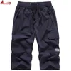 Mäns shorts plus storlek 7xl 8xl Mens Knee Lenght Last Shorts Casual Elastic Midje Fitness Bermudas Male Breattable Beach Surfings Shorts Män 230515