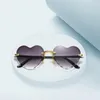 Lunettes de soleil 2023 mode coeur forme femmes marque concepteur belle lunettes de soleil sans monture pour femme Vintage rose dames nuances