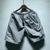 Shorts pour hommes Style d'été décontracté femmes maille respirant boussole Patch surdimensionné plage métal Nylon 230516