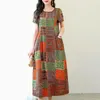 Feestjurken mode bloemen gedrukte zomerjurk Vestidos vintage elegante slanke korte mouw slanke nek vrouwen a-line zakken