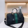 Vendi borsone di design con lettera g Borsa da donna di design Borsa da viaggio ad alta capacità Borsa per bagagli classica di moda con cerniera Borsa sportiva per esterni