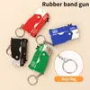 Ny Universal Mini Keychain Car Keychain Toy Gun Shooting Pistol Kid Outdoor Party Folding Metal Gun Present Car Styling Keyring