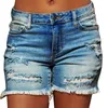 Shorts pour femmes Short en jean déchiré bleu avec poches à pompons Femmes Été Streetwear Taille haute boutonné Sexy Hole Rave Jean Shorts 230516