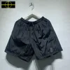 Pantalones cortos para hombre 22SS Celana Pendek Kasual Pria Wanita Mesh Bernapas Kompas Patch Bordir Lencana Besar Pantai Logam Nilon 230515