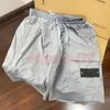 Shorts masculinos casuais de náilon cargo de grife verão tendência praia curto masculino secagem rápida cordão solto calças curtas tamanho asiático M-2xl271C