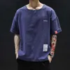 T-shirt da uomo 5XL 4XL 115KG Abbigliamento da uomo Camicia hip-hop allentata Manica da uomo Young Tide Maglietta da uomo estiva con maniche corte in tessuto di lino J230516