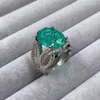 Cluster Anneaux Design De Mode S925 Argent Ovale Oeuf Forme Paraiba Tourmaline Pour Les Femmes À Haute Teneur En Carbone Daimond Bague De Mariage Déclaration Bijoux