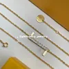 2023 18K Gilded Necklace Earstuds Fashion Women's Fashion Designer Brand F Letter Pendant Necklace Luxury Pearl Chain Sweater Necklace