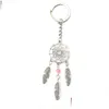 Nyckelringar Ny mode Fånga drömbilskedjan Feather Metal Keychain Men Women Holder Valentine's Gift 920 Q2 Drop Leverans smycken Otgxu