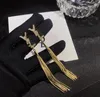 Nunca desapareceu 18k Brincos de charme banhado a ouro Lúcrica de designers de designer de luxo Carta da marca de aço inoxidável Brinco embutido Shrestone Tassel Ear Stud