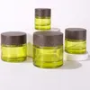 Bouteilles de stockage Bocaux cosmétiques en verre vert olive Bouteille vide de conteneurs d'échantillon de maquillage avec des couvercles en plastique étanches de grain de bois pour la lotion