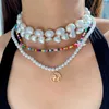 チョーカートレンディシンプルなハート女性用不規則な真珠のネックレスバロックマップペンダントビーズチェーンネックレス