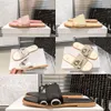 2023 Kvinnors trämula Platta sandaler Tofflor designermärke canvas tofflor vita svarta segel dammode utomhus strand tofflor skor