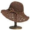 Cappelli a tesa larga Cappello da sole in paglia da donna Classico piatto da spiaggia Protezione estiva Stile floscio Panama ripiegabile arrotolato