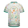 Camisa de diseñador Camisa de bolos con estampado de botones para hombre Camisas casuales florales de Hawaii Vestido de manga corta ajustado para hombre Camiseta hawaiana M-3XL U25