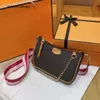 Designer tassen Eenvoudig zakje leer op riem schoudertas vrouwen crossbody bloem ketting klep handtas mini tassen totte pochette avond portemonnee monogrammen messenger