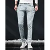 Jeans da uomo per pantaloni da uomo con piedini elastici slim fit Adolescenti e studenti Versatile Jean White Snowflake Style