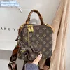 vendita all'ingrosso borse a tracolla da donna eleganti finalizzare il design lettera stampata borsa moda di strada decorazione nastro moda borsa a tracolla rivetto zaino 2051 #