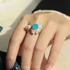 Bandringe Einzigartiger Paraiba-Turmalin-Smaragd-Edelstein-offener Ring für Frauen Luxus 925 Sterling Silber Cocktailparty-Bandschmuck Großhandel J230517