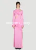 Kim Kardashian Red Carpet Evening -jurken met hete roze fuchsia uit de lange mouwen Cutout Bow Mermaid Prom Formal Dress Wear
