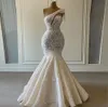 One Shoulder Mermaid Lace Wedding Dress with Pearls and Tassels