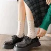 Sokken kousen Japans schattige ruches stijl bloem borduurwerk lange sokken vrouwen solide kleur harajuku retro crew socks p230517