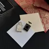 fashion brass perfume bottle accessories Chandelier Earrings c symbol Earrings With paper card