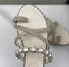 2024 Nuovi sandali Combinazione cinturino incrociato Pantofole da donna Sandali piatti con perle Design semplice ed elegante Tinta unita Clip Toe Infradito Pantofola Moda Versatile