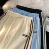 Pantaloncini da donna Wakamono Celana Musim Panas Wanita Beige Pendek Olahraga Gaya Korea Longgar dan Tipis Kasual Lebar Kaki Drop 230517