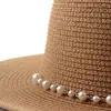 Berretti Protezione solare Cappello da sole Donna versione coreana dell'ombrellone Piccola catena di perle di paglia da spiaggia all'aperto con parte superiore piatta