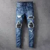 Jeans impilati di design Amirly Jeans viola europei per trapuntatura da uomo strappati per pantaloni vintage di marca di tendenza Pantaloni skinny slim pieghevoli da uomo