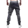 Herrbyxor Herrstångs blixtlåsfickor Ankel bundna Sweatpants Sportbyxor Skinny Casual Slim High midje Baggy