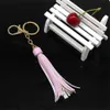 Novo 11 cores Moda Tassels Taxchain liga Círculo PU PU couro Fringe Keyring Menino Menino Bag de decoração de carro Diy Jóias Acessórios