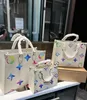 Bolsa baguete multicolorida bolsa de lona feminina bolsas tiracolo com letras bordadas ferrolho magnético bolsa corpo cruzado ferragens douradas alça removível alça de ombro a352