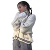女性のニットティー秋女性ベージュVネックスター刺繍カーディガンカジュアルルーズセーターファッション気質ニットジャケットY2Kストリートウェア230518