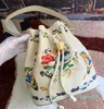 Designer-florale emmertas Designer Crossbody Bags Drawstring Handtassen Beweegbare handgreep Bloemen Afdrukken Pocket String Schoudertassen Roterende letters Detacha