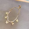 Link armbanden hibride glanzende gele goud kleur kubieke zirkonia vlinder bedelarmband armband voor vrouwen bruiloftsfeestje sieraden