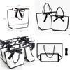 Emballage Cadeau 5 Pcs Blanc Carton Noir Cadre Boutique Sac En Papier Pour La Promotion Vêtements Portable Fourre-Tout D'affaires Emballage Baggift Drop Deli Dhlo7