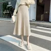 Skirts Winter Thickened Rib Knitted Large Swing Maxi Long Skirts Elegant Solid A-Line Pleated Ankle Length Knit Midi Skirts Black Beige 230518