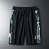 Summer Ice Mesh Men's Camouflage Luftkonditionerade elastiska shorts Snabbtorkning Capris andningsbara sportmittenbyxor