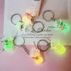 Nieuwe nieuwe creatieve Mini Luminous Milk Bubble Tea Cup Keychain For Women Girls Leuke tas ornamenten Auto Key Hangers Prijs speelgoedgeschenken