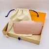 Fashion Designer Storage Bags Sunlasses Bag Pendant Unisex Classic Lux Leather Purse Coin Money Card Holder 2021 Christmas Gift Wa234L