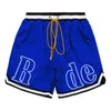 Rhude Designers Pantaloncini da uomo Mesh Traspirante Pantaloni larghi da spiaggia estivi alla moda Multicolore Opzionale 3O33