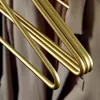 Wieszaki stojaki 5PCS Solid metalowe wieszaki do płaszcza trwałe szwane matowe złote/sliver ubrania spodnie Sweter Stojaki do przechowywania wieszaki Organizator 230518