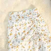 Kjolar sommar Faldas Mujer Moda Hög midja Slim Flower Print Midi -kjolar Pleated Oregelbundet Drawstring Design Sense Mermaid Jupe 230518
